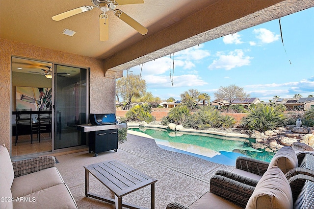 view of patio / terrace featuring ceiling fan, area for grilling, and a fenced in pool