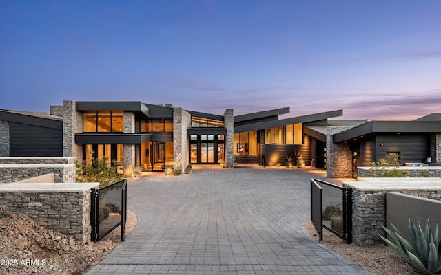 9643 E Cintarosa Pass, Scottsdale, AZ 85262 - back of property with stone siding and a gate