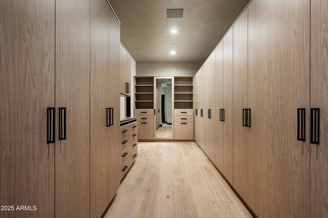 9643 E Cintarosa Pass, Scottsdale, AZ 85262 - walk in closet with light wood finished floors