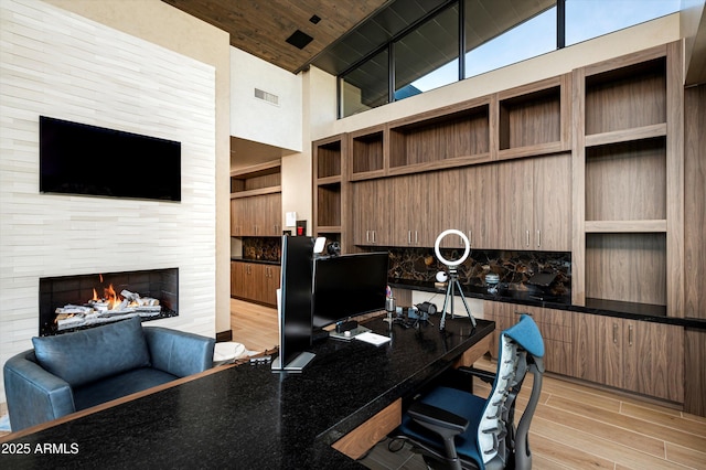 9643 E Cintarosa Pass, Scottsdale, AZ 85262 - office with a fireplace, visible vents, high vaulted ceiling, light wood finished floors, and wooden ceiling