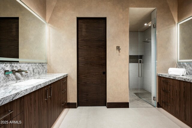 9643 E Cintarosa Pass, Scottsdale, AZ 85262 - full bathroom with tile patterned flooring, vanity, and a stall shower