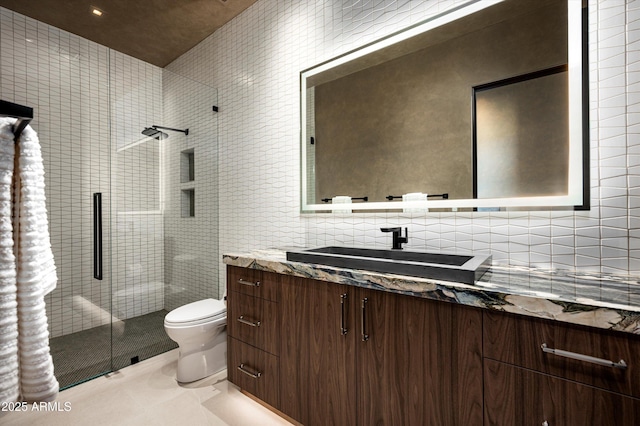9643 E Cintarosa Pass, Scottsdale, AZ 85262 - bathroom featuring a shower stall, vanity, and toilet
