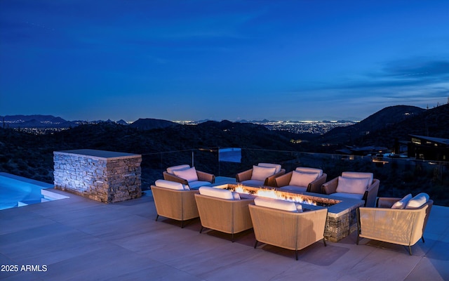 9643 E Cintarosa Pass, Scottsdale, AZ 85262 - view of patio / terrace featuring a fire pit and a mountain view