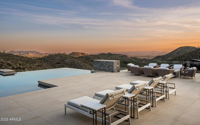 9643 E Cintarosa Pass, Scottsdale, AZ 85262 - view of patio / terrace with a mountain view