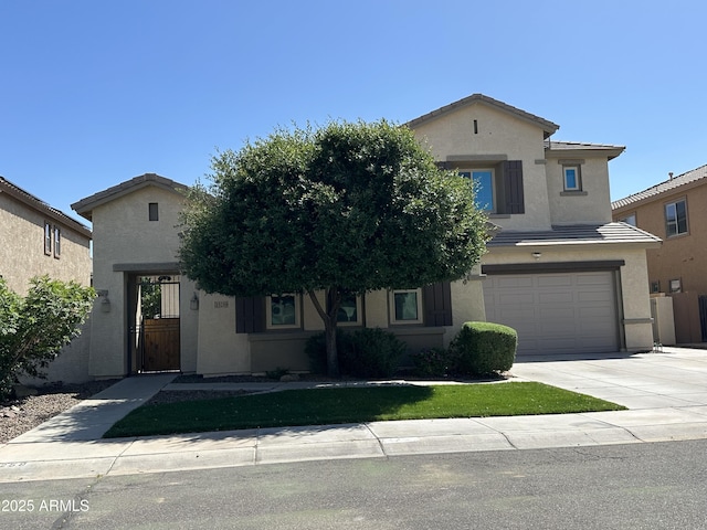 13259 W Flower St, Litchfield Park, AZ 85340 - view of property hidden behind natural elements with a garage, stucco siding, and driveway
