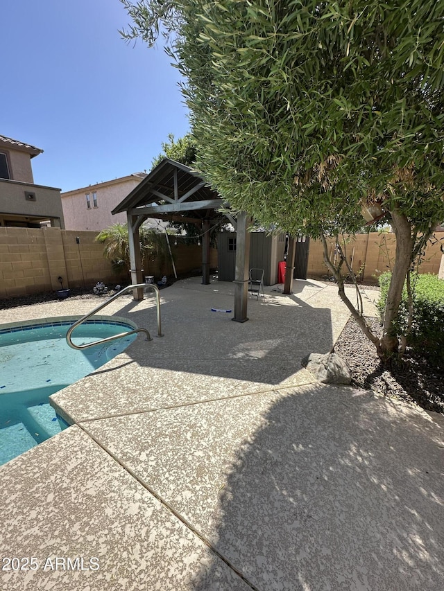 13259 W Flower St, Litchfield Park, AZ 85340 - view of pool featuring a fenced in pool, a gazebo, a fenced backyard, and a patio area