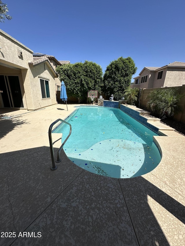 13259 W Flower St, Litchfield Park, AZ 85340 - view of swimming pool featuring a patio, a fenced backyard, and a fenced in pool
