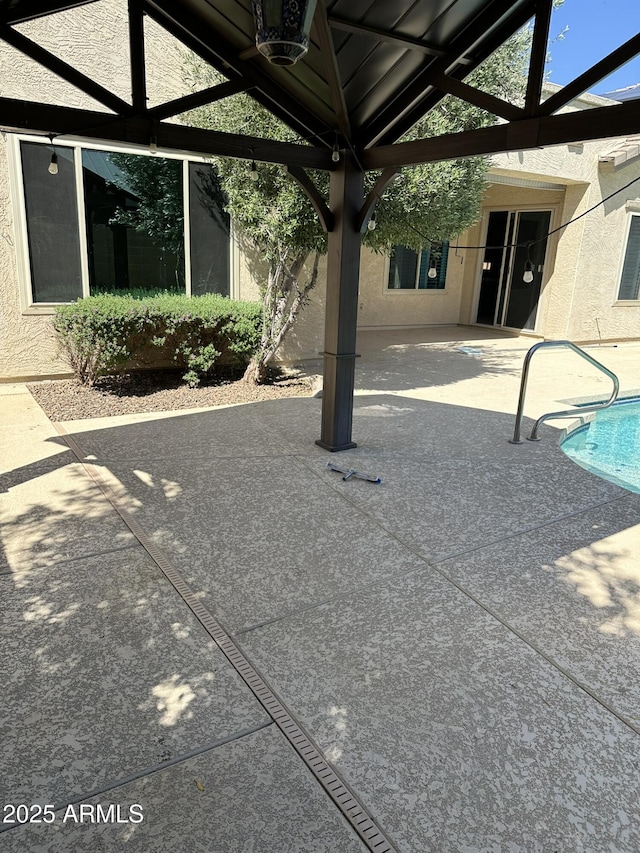 13259 W Flower St, Litchfield Park, AZ 85340 - view of patio with an outdoor pool