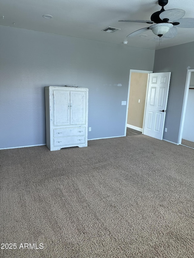 13259 W Flower St, Litchfield Park, AZ 85340 - unfurnished bedroom with visible vents, a ceiling fan, baseboards, and carpet floors