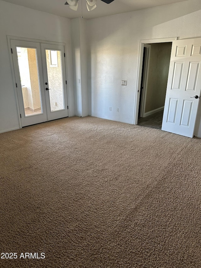 13259 W Flower St, Litchfield Park, AZ 85340 - empty room with ceiling fan, french doors, and carpet