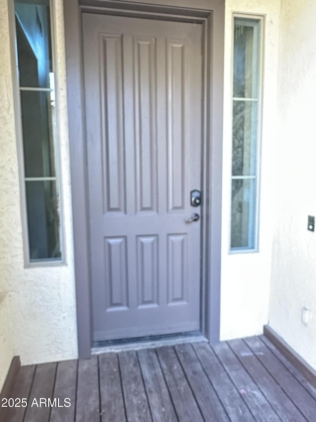 13259 W Flower St, Litchfield Park, AZ 85340 - doorway to property with stucco siding