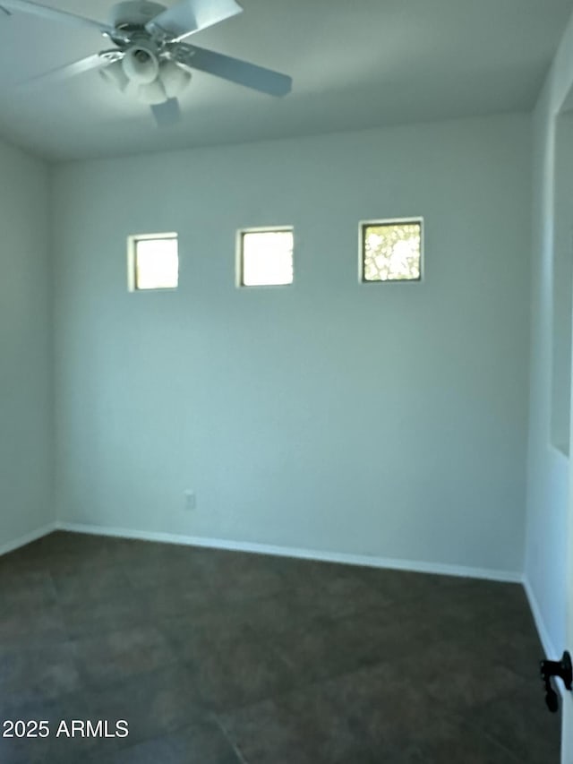 13259 W Flower St, Litchfield Park, AZ 85340 - unfurnished room featuring baseboards, ceiling fan, and carpet