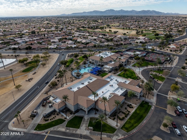 birds eye view of property with a residential view and a mountain view