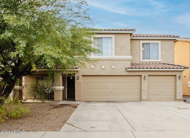 436 N 10th Pl, Coolidge, AZ 85128 - view of front of house with driveway, stucco siding, an attached garage, and a tiled roof