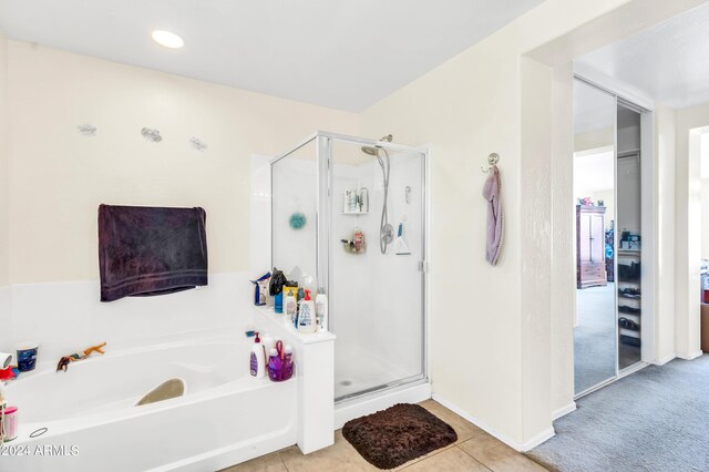 436 N 10th Pl, Coolidge, AZ 85128 - ensuite bathroom featuring a bath, connected bathroom, tile patterned floors, and a shower stall