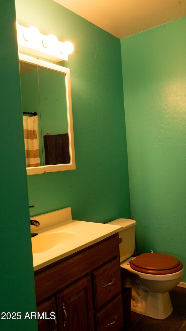 28921 N 220th Dr, Wittmann, AZ 85361 - bathroom featuring toilet, vanity, and a shower with curtain