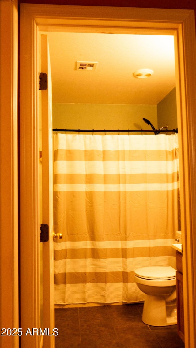 28921 N 220th Dr, Wittmann, AZ 85361 - bathroom featuring toilet, tile patterned flooring, and vanity
