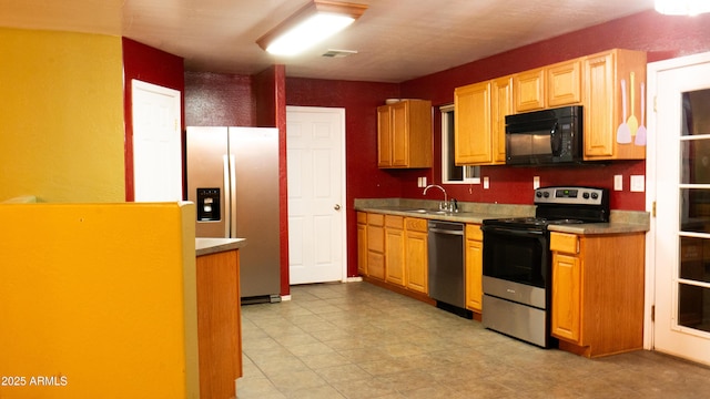 28921 N 220th Dr, Wittmann, AZ 85361 - kitchen featuring appliances with stainless steel finishes and a sink