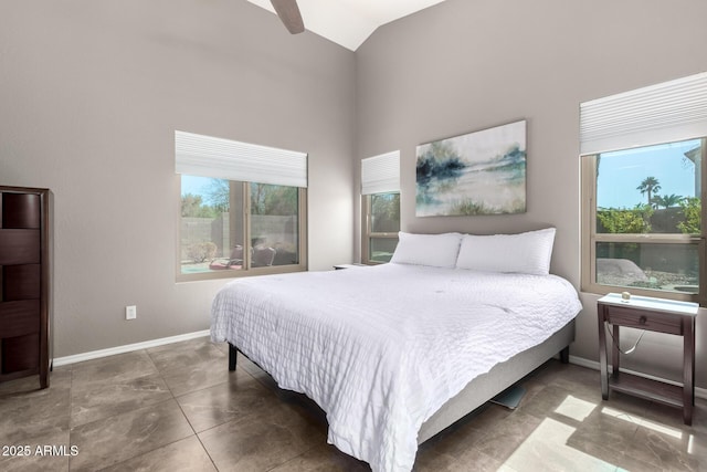 bedroom featuring ceiling fan and vaulted ceiling