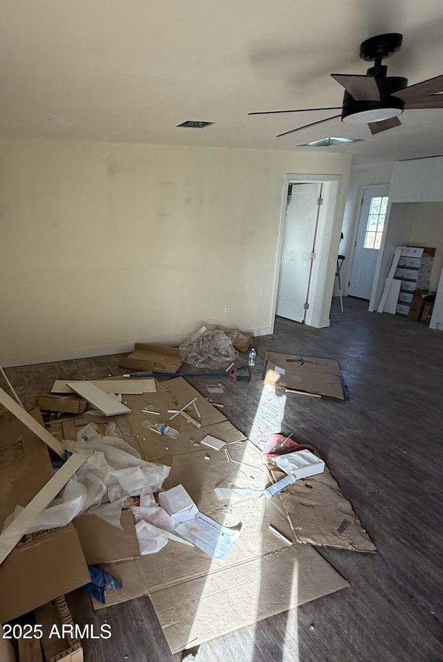 interior space with hardwood / wood-style flooring and ceiling fan