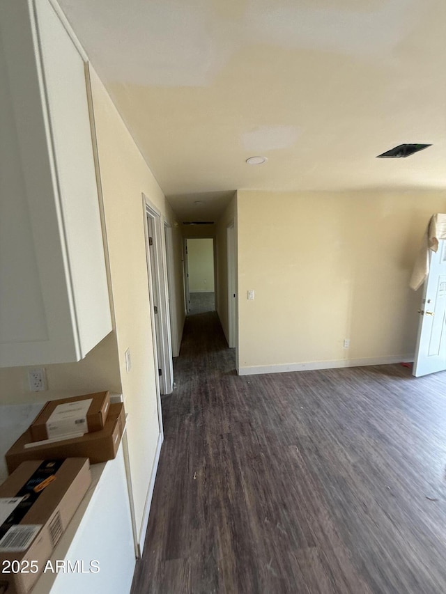 interior space with dark hardwood / wood-style floors