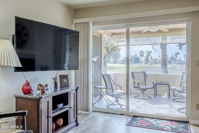 entryway featuring ceiling fan and light hardwood / wood-style floors