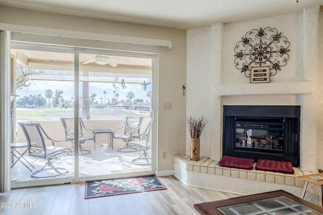 entryway with hardwood / wood-style floors and ceiling fan