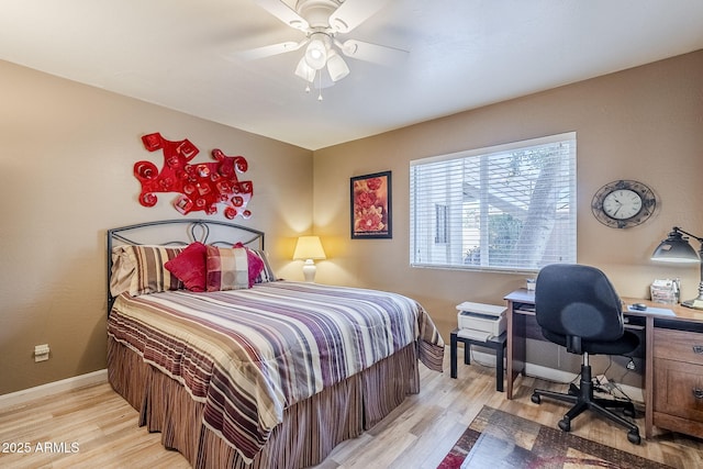 bedroom featuring ceiling fan and light hardwood / wood-style floors