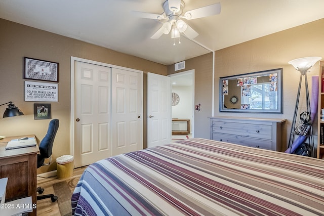 bedroom with a closet and ceiling fan