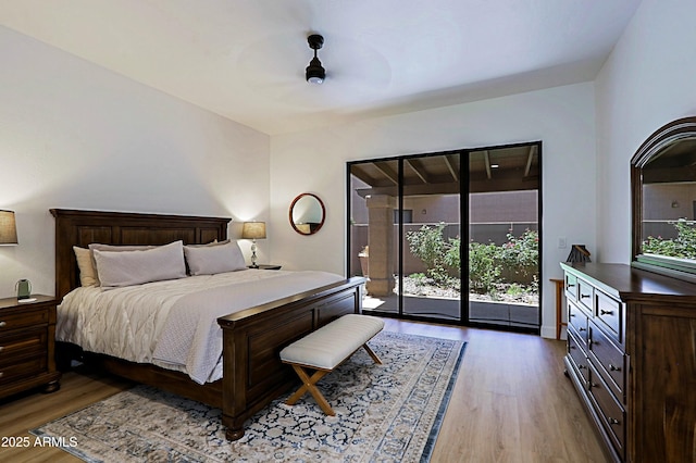 4039 E Paradise Dr, Phoenix, AZ 85028 - bedroom with access to outside and wood finished floors