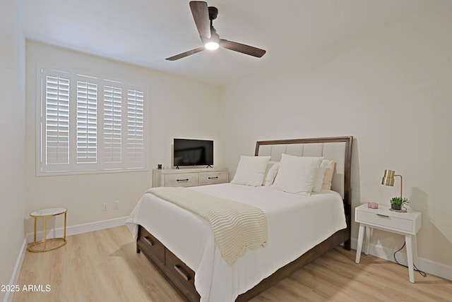 4039 E Paradise Dr, Phoenix, AZ 85028 - bedroom featuring light wood-type flooring, baseboards, and a ceiling fan