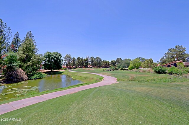 4039 E Paradise Dr, Phoenix, AZ 85028 - view of community with a lawn and a water view