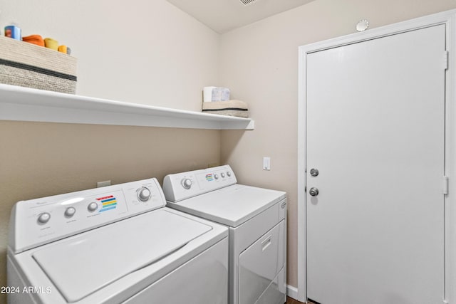 laundry area featuring independent washer and dryer