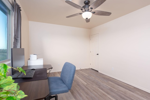 office area featuring ceiling fan and hardwood / wood-style floors