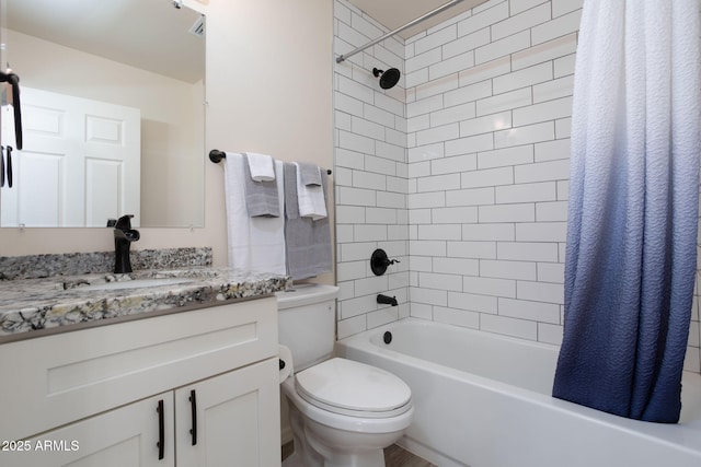 full bathroom featuring toilet, vanity, and shower / bathtub combination with curtain