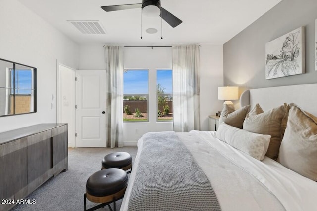 carpeted bedroom with ceiling fan