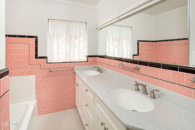 bathroom featuring tile patterned flooring, a tub to relax in, vanity, crown molding, and tile walls