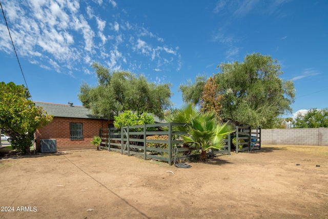 view of yard featuring central AC