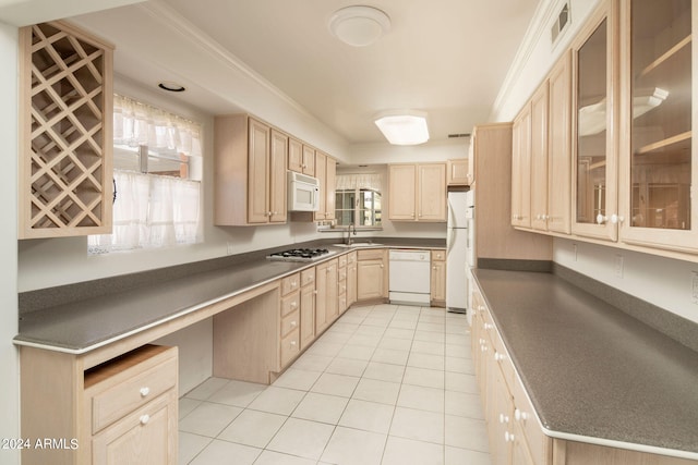 kitchen featuring white appliances, light tile patterned floors, ornamental molding, sink, and light brown cabinets