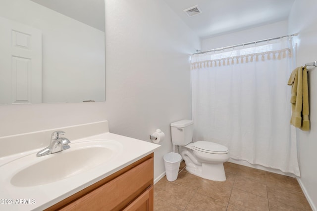 full bathroom with visible vents, a shower with shower curtain, toilet, tile patterned floors, and vanity