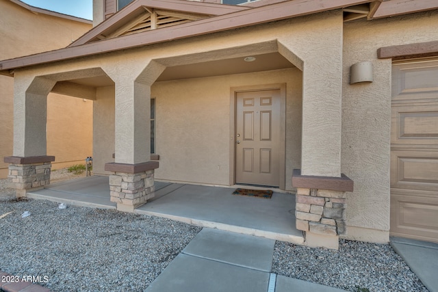 property entrance with a garage