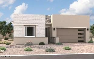 15842 W Miami St, Goodyear, AZ 85338 - view of front of home with a garage, driveway, and stucco siding