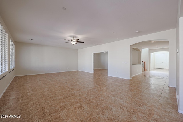 spare room featuring ceiling fan