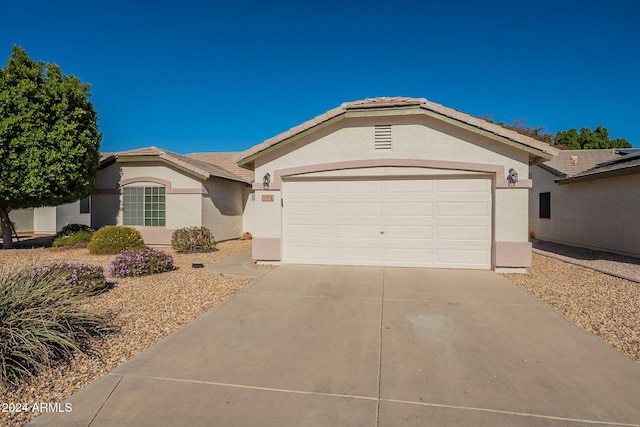 ranch-style house with a garage