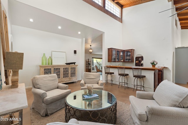 5540 E Mercer Ln, Scottsdale, AZ 85254 - living area with a towering ceiling, recessed lighting, bar area, stairway, and wood ceiling