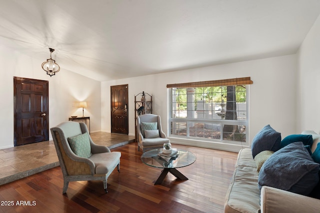 5540 E Mercer Ln, Scottsdale, AZ 85254 - living area featuring lofted ceiling, hardwood / wood-style floors, and a chandelier