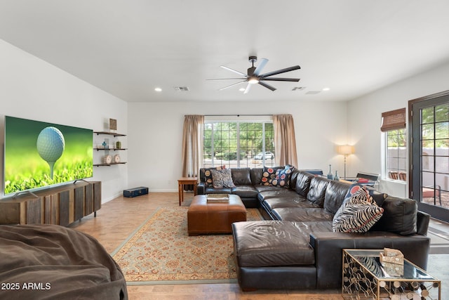 5540 E Mercer Ln, Scottsdale, AZ 85254 - living room with healthy amount of natural light, a ceiling fan, and recessed lighting