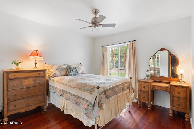 5540 E Mercer Ln, Scottsdale, AZ 85254 - bedroom featuring dark wood finished floors and ceiling fan