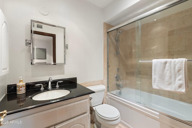 5540 E Mercer Ln, Scottsdale, AZ 85254 - bathroom with shower / bath combination with glass door and vanity
