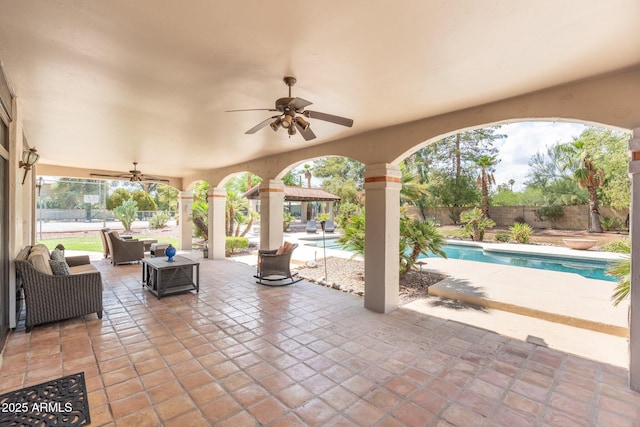 5540 E Mercer Ln, Scottsdale, AZ 85254 - fenced backyard with ceiling fan, an outdoor living space, a patio area, and a gazebo